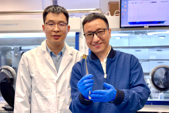 The lead corresponding author Prof. Zhou Yuanyuan (right) and co-first author Dr. Guo Pengfei (left) are showing a perovskite solar cell prototype made for a proof-of-concept demonstration of the novel laminate-structured interface. The lead corresponding author Prof. Zhou Yuanyuan (right) and co-first author Dr. Guo Pengfei (left) are showing a perovskite solar cell prototype made for a proof-of-concept demonstration of the novel laminate-structured interface.